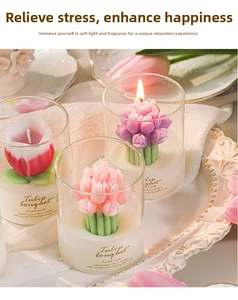 Detailed view of tulip-shaped scented candles in glass jars with floral labels