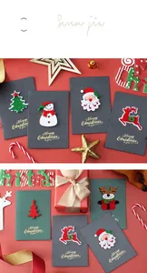 Detail of 3D felt Christmas cards with reindeer and Santa designs on premium paper