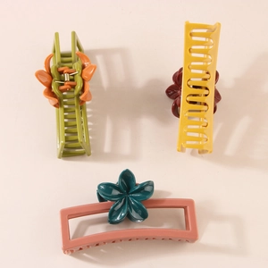 Set di tre grandi mollette per capelli opache a fiore in varie combinazioni di colori vivaci
