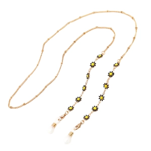 Elegant gold daisy eyewear chain with yellow enamel flowers and anti-slip rubber loops