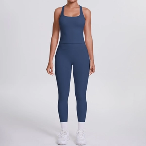 Detail view of navy blue racerback tank top and high-waisted yoga leggings set