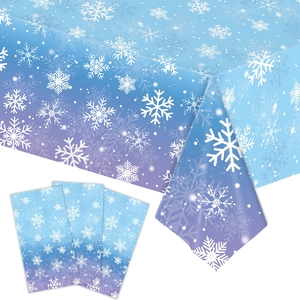 Blue-purple gradient winter snowflake tablecloth set with matching decorative napkins