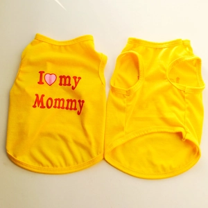 Detail view of yellow pet vest featuring a red I Love My Mommy print on soft cotton fabric