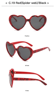 Three-view layout of heart-shaped sunglasses with red spider web frames and dark grey lenses