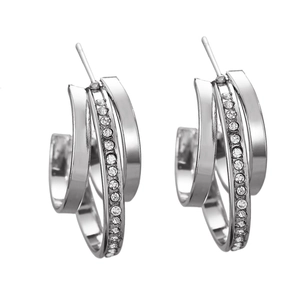 Macro shot of silver multi-layer C-shape hoop earrings with clear cubic zirconia stones