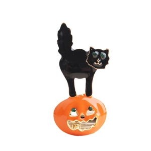 Halloween black cat sitting on orange pumpkin brooch pin with green crystal eyes