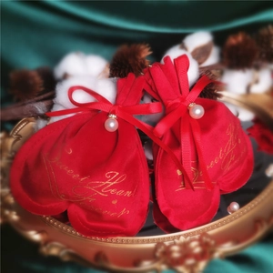 Red heart velvet gift bag with drawstring, pearl charm and golden Sweet Heart text