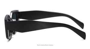Rear view of matte black kids cat-eye sunglasses with unique geometric wavy temples