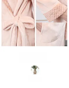 Detail of pink flannel bathrobe showing quilted cuffs, waist tie, and side pocket texture