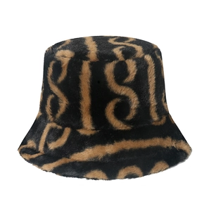 Winter plush bucket hat with wavy S-pattern design in black and brown faux fur