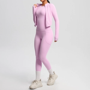 Pink yoga set featuring slim fit zipper jacket and high waist leggings with side pockets