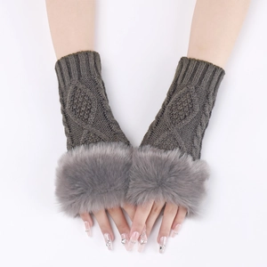 Detail of dark grey cable knit arm warmers with plush light grey faux fur trim