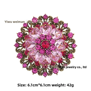 Retro round pink crystal brooch with gold hollow carving and dimensions showing 6.1cm size