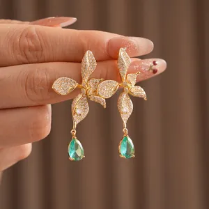Vintage flower earrings with green water-drop crystals and white pavé zircon details