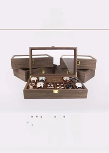 Wooden watch storage box with clear glass lid multi-layer jewelry organizer display case.