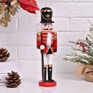 Detailed view of hand-painted wooden nutcracker ornament with festive Christmas decor
