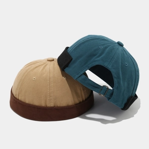 Cotton docker brimless hats in khaki and navy with adjustable metal buckles