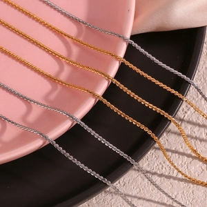 Minimalist 18K gold and silver titanium steel S-chain necklaces shown in a stylish layout