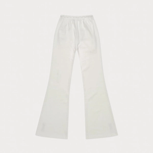 Front flat lay of white flare athletic pants with high-waisted elastic band and soft fabric