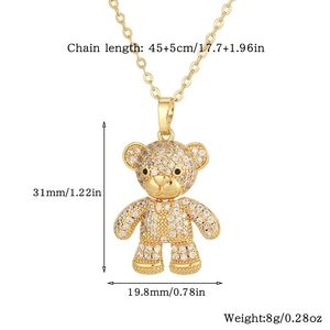 Detail view of gold teddy bear pendant showing dimensions 31mm x 19.8mm and weight 8g