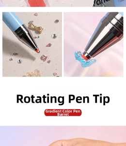 Detail of gradient nail dotting pen with wax tip picking up rhinestones and butterfly charms