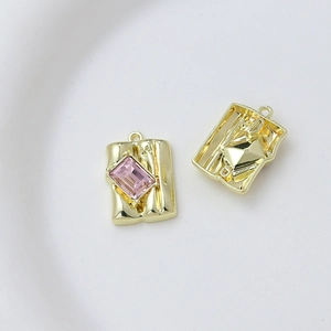Detailed view of pink zircon heart pendant with 18K gold plating for DIY jewelry
