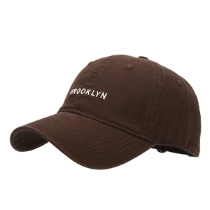 Classic dark brown baseball cap with white Brooklyn embroidery and adjustable curved brim