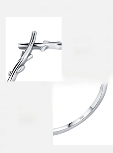 Macro detail of S925 sterling silver stamp on vintage olive branch cross ring