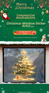 Detail of golden Christmas tree window sticker with star topper and festive gift boxes