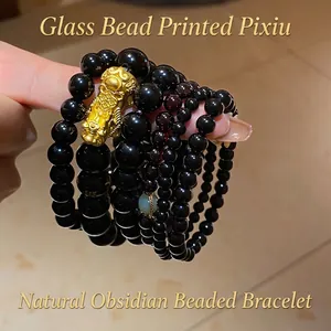 Elegant multi-layer black obsidian beaded bracelet with gold PiXiu and green jade accent