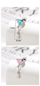 Detail of heart-shaped wing earrings with zircon stones and water-drop pendants