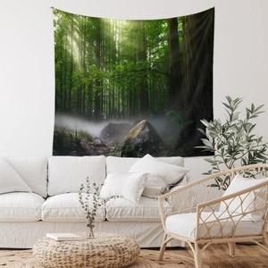 Detail shot of a forest tapestry showing misty trees and sunlight in a living room