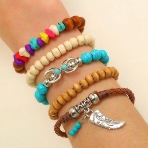 Bohemian stackable bracelet set with turquoise beads, wood elements and faux leather