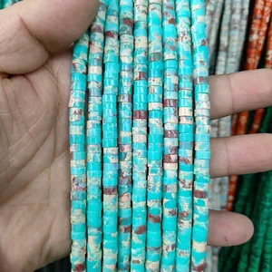 Macro view of natural turquoise spacer beads with brown earthy patterns for DIY jewelry