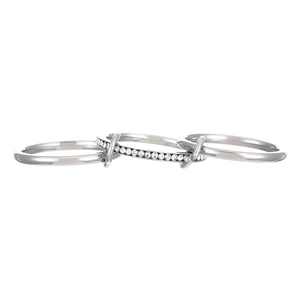 Detailed macro view of interlocking silver rings with pavé set cubic zirconia stones