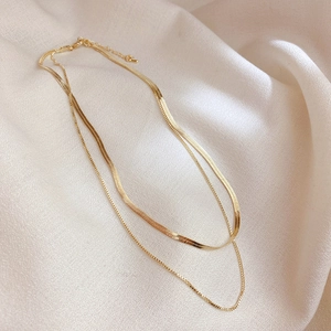 Double-layered gold-plated stainless steel necklace with flat snake chain and round link