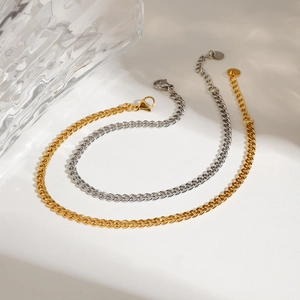 Two-tone gold and silver double-layered Cuban link anklets with lobster clasps