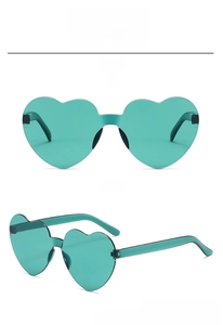 Detail view of heart-shaped rimless green sunglasses from front and 45-degree angles