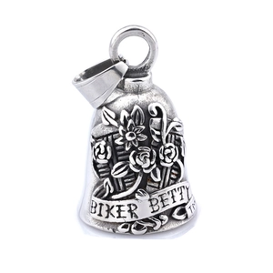Macro view of retro biker bell pendant with rose engraving and Biker Betty text detail