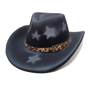 Detail of black western cowboy hat featuring leopard print belt and star pattern
