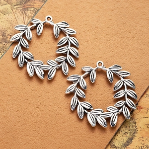 Pair of vintage silver olive branch leaf wreath pendants for DIY jewelry making crafts