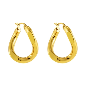 Detailed macro view of gold hollow teardrop earrings with a polished mirror finish