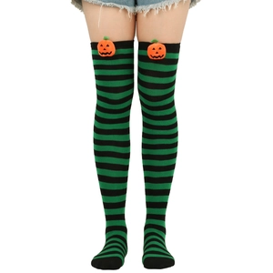 Detail of green and black striped over-knee socks with plush pumpkin patch for Halloween