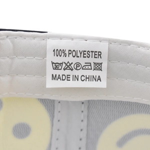 Macro view of the internal washing label and stitching on this polyester smile baseball cap