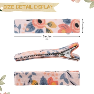 Floral fabric hair clips set with pink floral pattern for kids shown from various angles