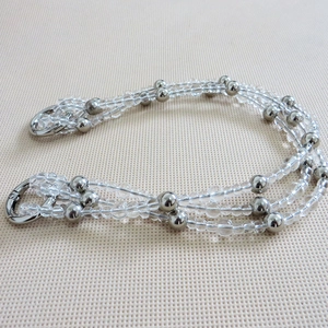 Three-strand braided clear crystal and silver bead purse chain with metal spring clasps
