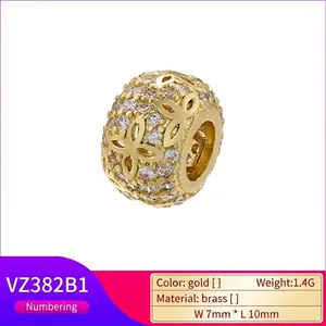 Gold hollow floral spacer charm with cubic zirconia in brass for DIY jewelry
