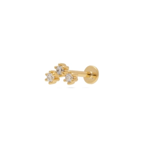 Macro detail of gold S925 silver flat back stud with three clear zircon stones