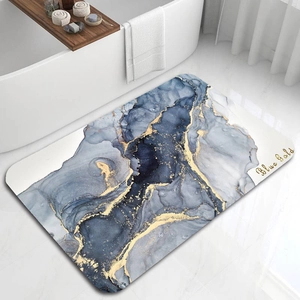 Detail view of marble pattern bath mat with anti-slip backing on bathroom tile