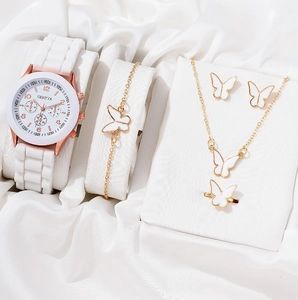 Elegant women's white quartz watch and butterfly jewelry set with golden finish
